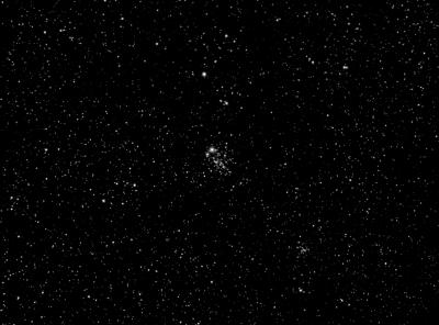 The "Dragonfly Cluster" or "Owl Cluster" (NGC 457). It looks more like an owl to me.